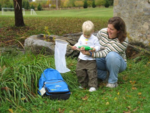 Child interacting with Nature Explorer Backpack